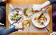 Nederlan­ders geven recordbe­drag uit aan horeca